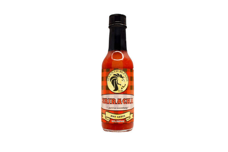 sriracha sauce bottle on white background