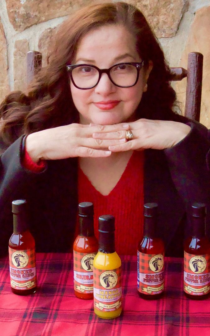 Nidia Ruiz with her hot sauces